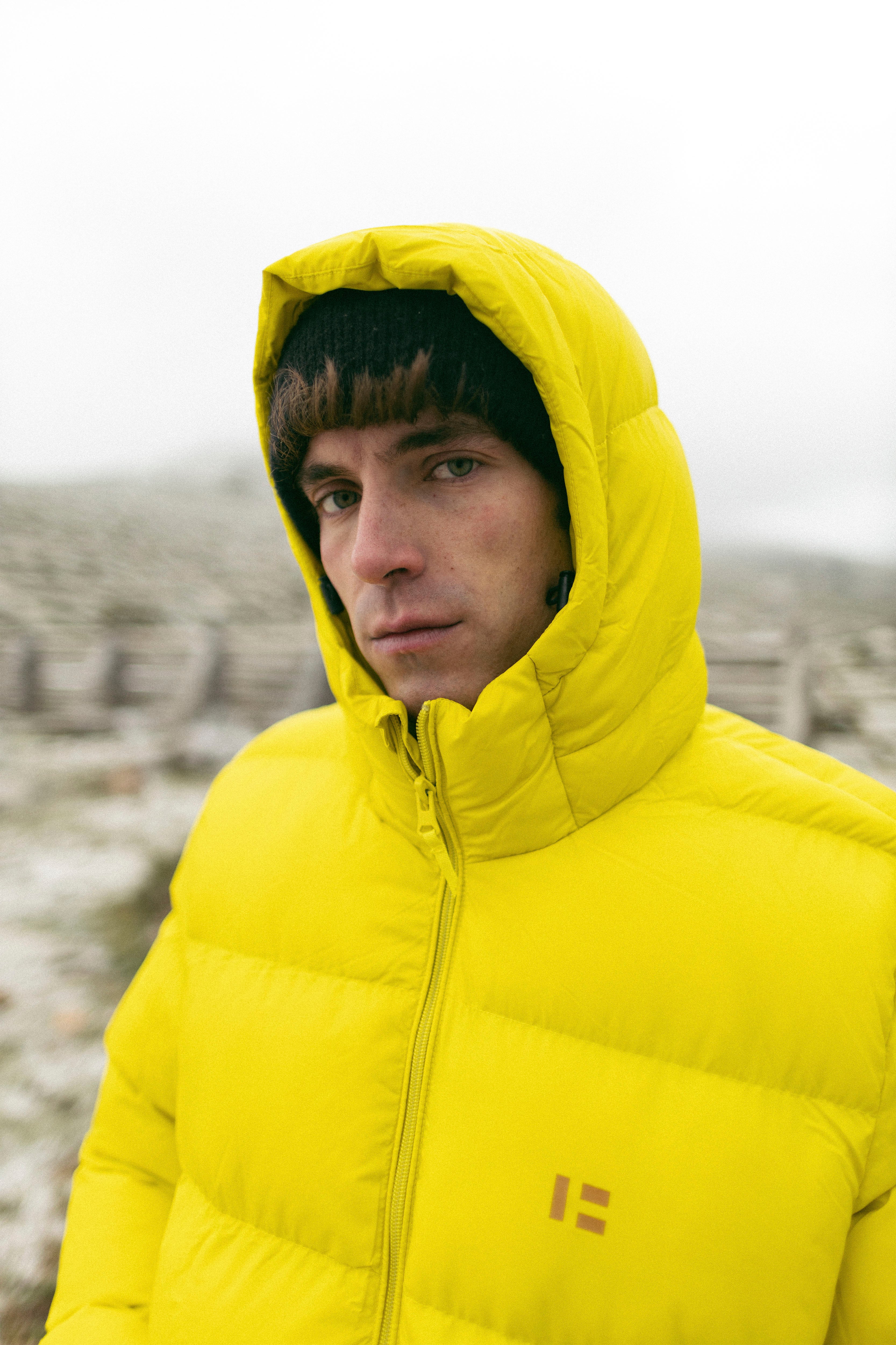 Yellow puffer coat with fur hood on sale